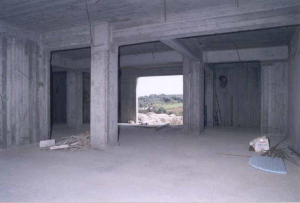 The bare basement space before work commenced