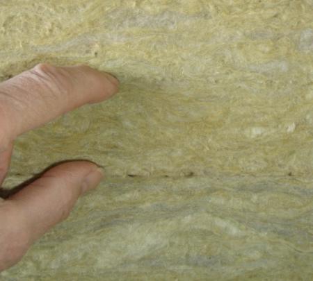 Stack of mineral wool slabs, end on view